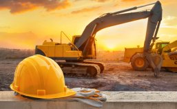 Banner Helm und Bagger im Sonnenuntergang Banner Helm und Bagger im Sonnenuntergang